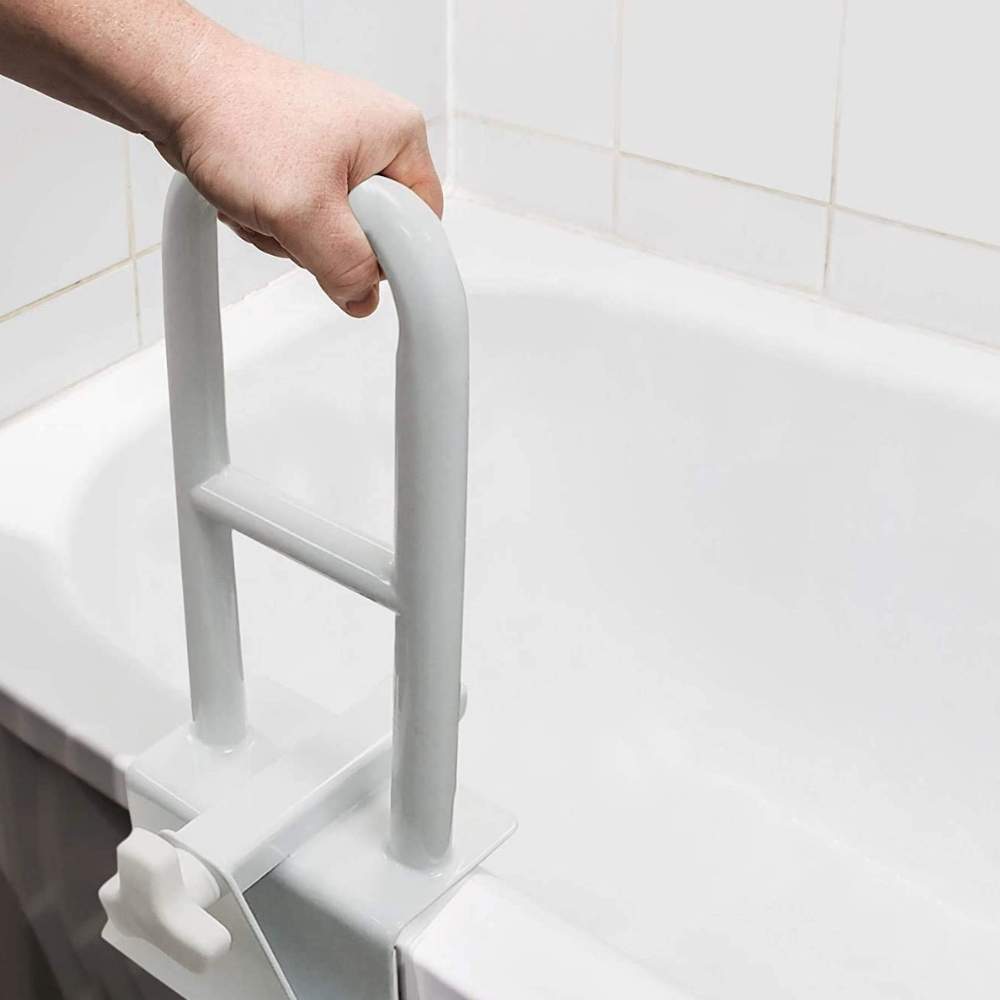 A clamp on bath safety rail fitted to the side of a bath